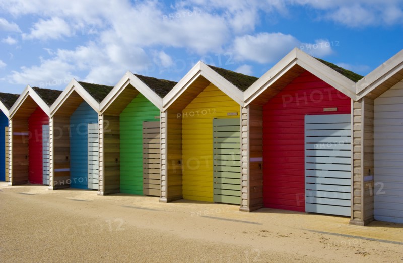 Row of different coloured beach huts, Blyth, Northumberland, 2010