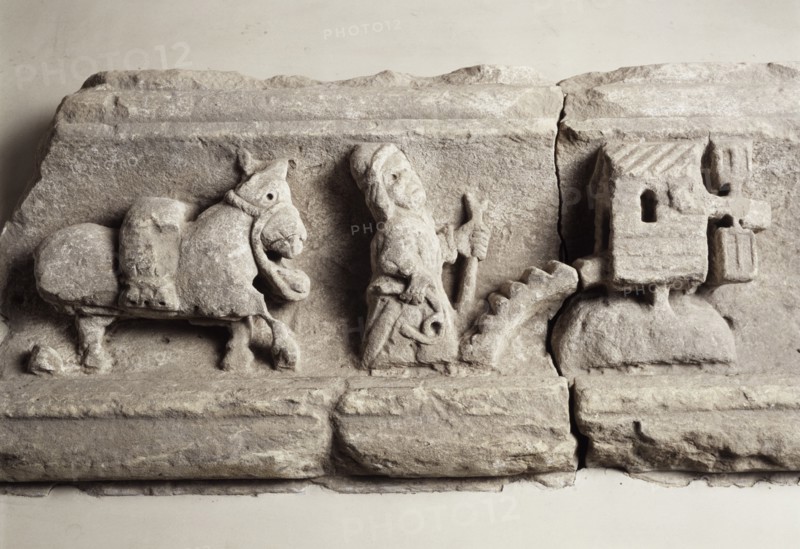 Stone carving depicting milling, museum of Rievaulx Abbey, North Yorkshire, c2013