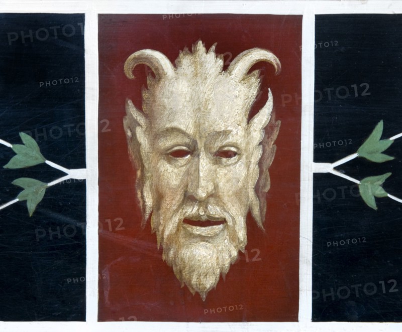 Detail of painted devil in the entrance lobby of Bankfield Museum, Halifax, West Yorkshire, c2010
