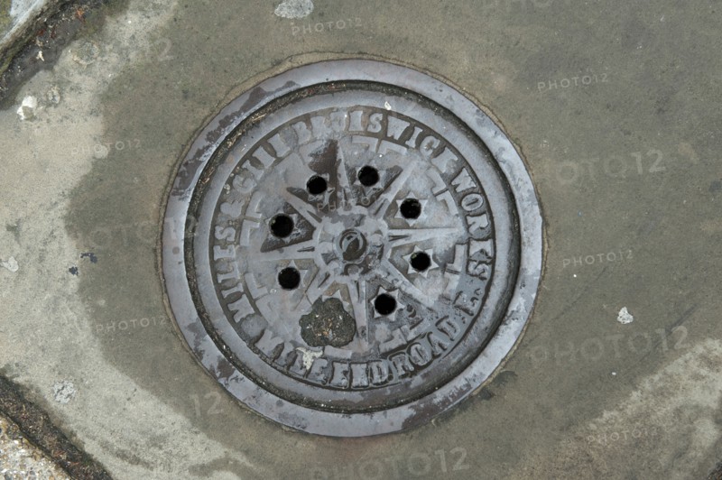 Coal hole plate outside 48 Arbour Square, Stepney, Tower Hamlets, London, 2010
