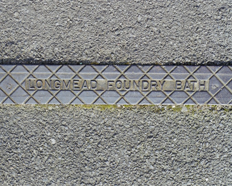 Pavement rainwater gully cover plate made by Longmead Foundry, Bath, Swindon, Wiltshire, 2006