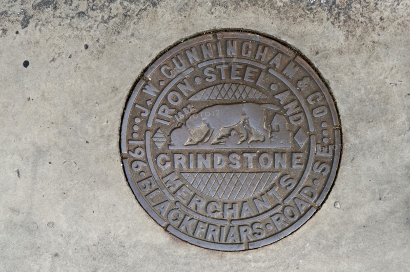 Coal hole plate made by JW Cunningham & Co, Lower Marsh, Lambeth, London, 2010