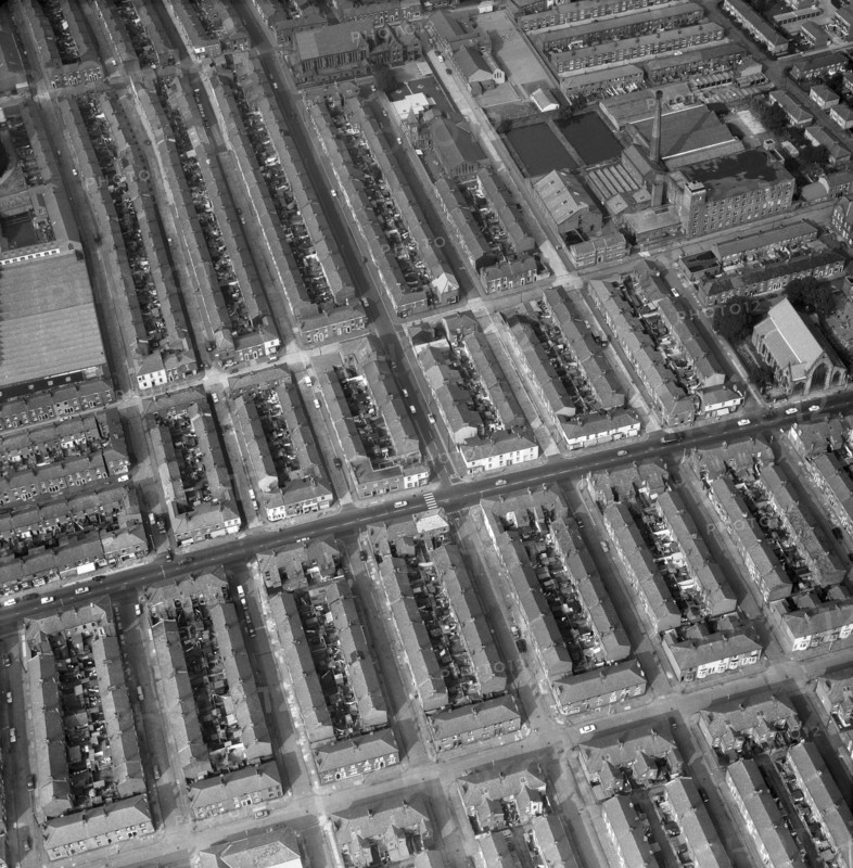 Aerial view of terraced houses, a mill and a church, Preston, Lancashire, 1971