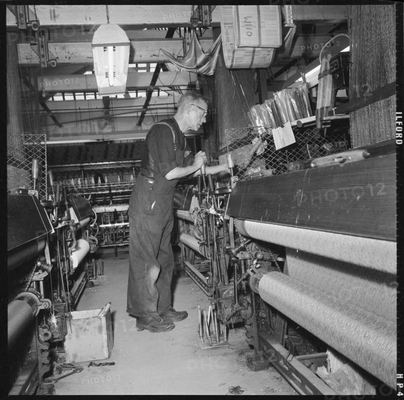 Weaver operating a Jacquard power loom, 1966-1974