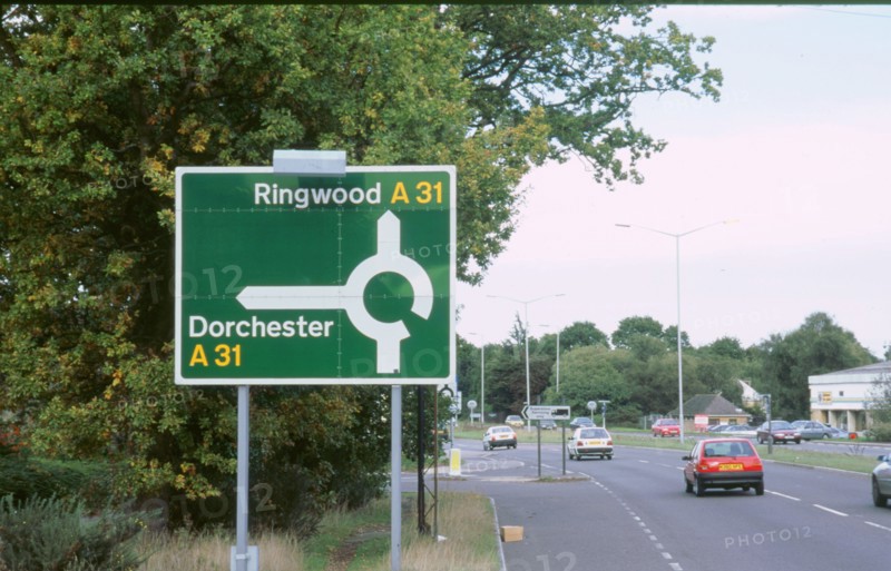 Road sign. A road. Artist: Unknown.