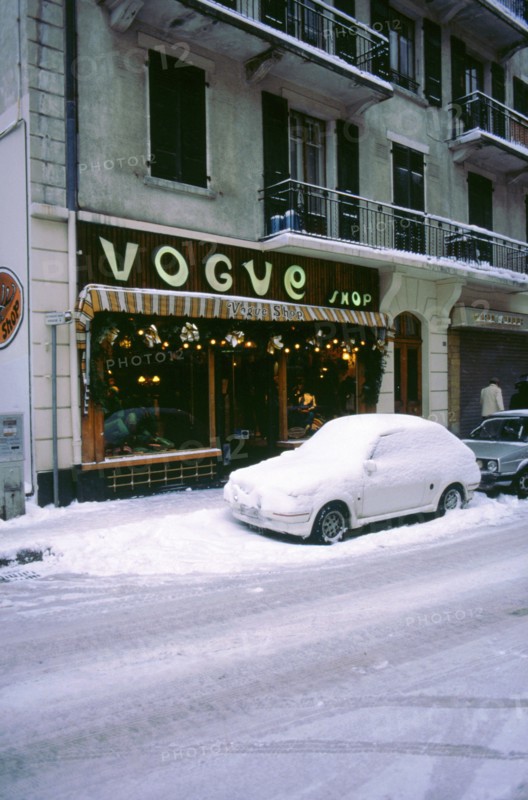 Car covered in snow in French street. Artist: Unknown.