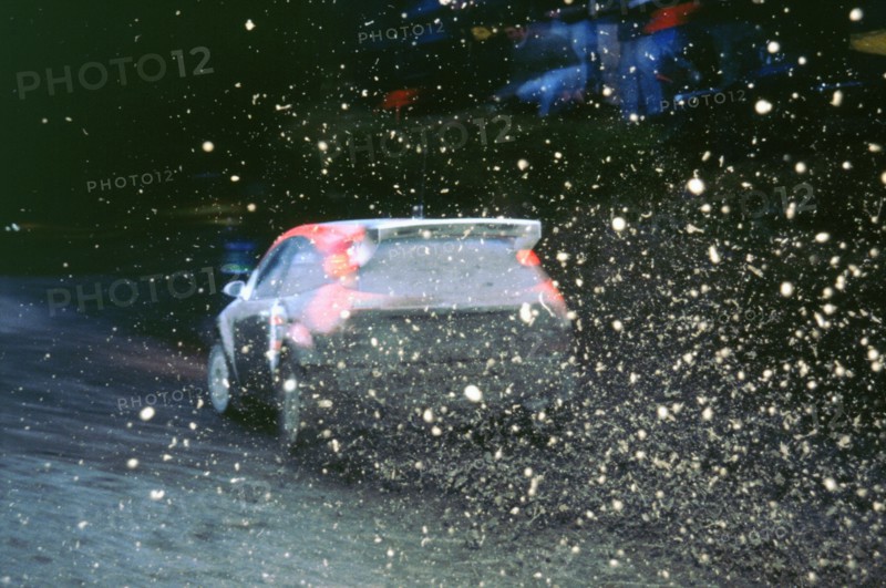 1999 Ford Focus WRC, C.McRae. Network Q Rally with flying mud!. Artist: Unknown.