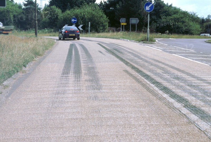 Tyre skidmarks on road surface. Artist: Unknown.