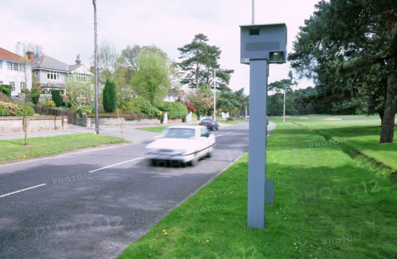 Speed Camera and traffic. Artist: Unknown.
