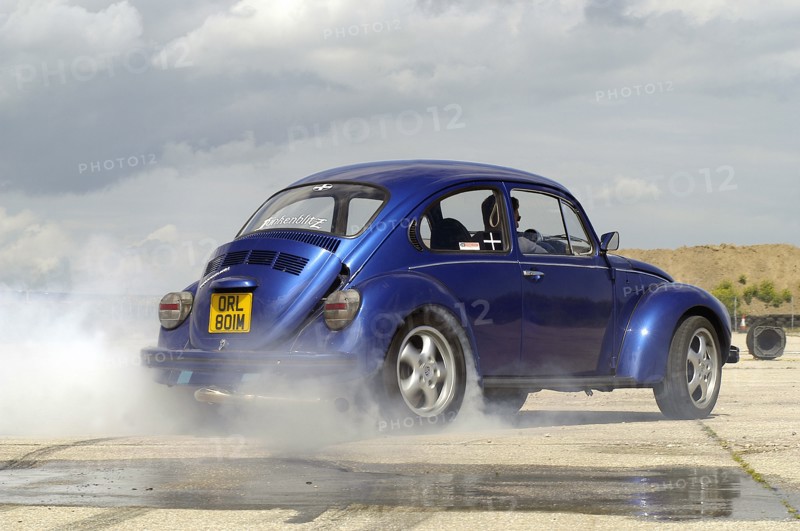 VW Beetle Burning out. Artist: Unknown.
