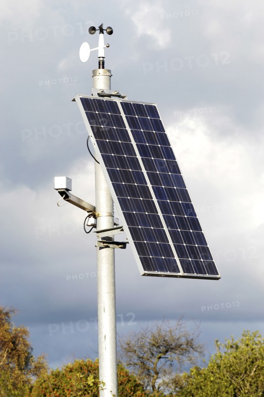 Solar Panel powering roadside equipment. Artist: Unknown.