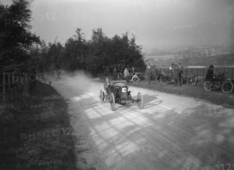 HR Godfrey driving a GN Bluebottle, Inter-Varsity Hillclimb, Tring, Hertfordshire, 5 March 1921. Artist: Bill Brunell.