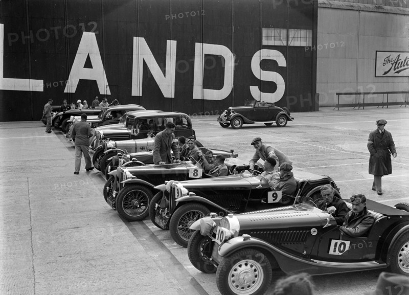 Cars on the start line at the MCC Members Meeting, Brooklands, 10 September 1938. Artist: Bill Brunell.