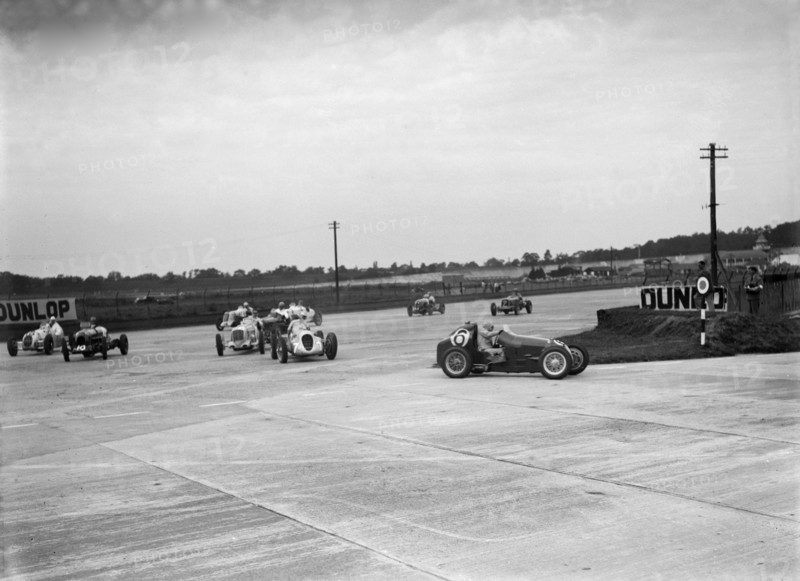 Motor race on the Campbell Circuit at Brooklands. Artist: Bill Brunell.