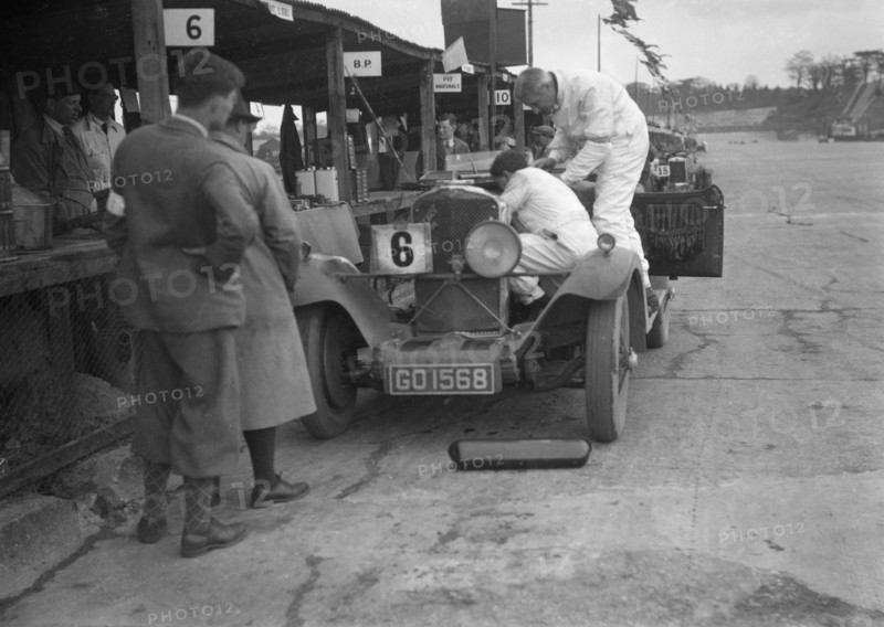 Talbot 90 of E and SJ Burt in the pits at the JCC Double Twelve race, Brooklands,  May 1931. Artist: Bill Brunell.