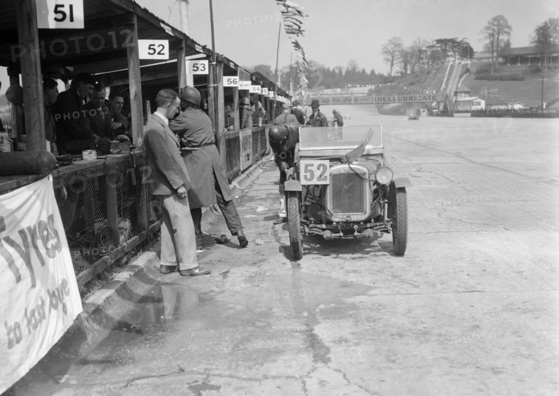 Austin Ulster of ECH Randall and WE Harker in the pits, JCC Double Twelve race, Brooklands, 1931. Artist: Bill Brunell.