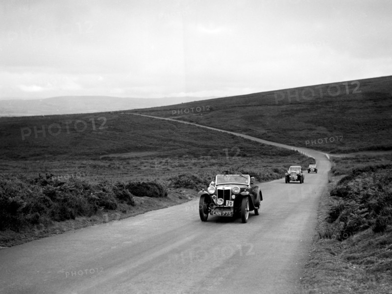 CH Richardson's MG PB ahead of a Singer B37 at the MCC Torquay Rally, July 1937. Artist: Bill Brunell.