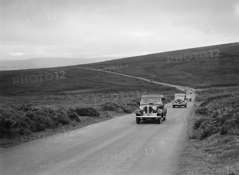 AS Whiddington's Frazer-Nash BMW ahead of RE Wright's Ford V8 at the MCC Torquay Rally, July 1937. Artist: Bill Brunell.