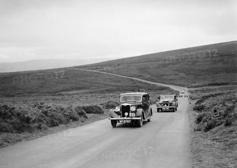 LA Forty's Riley Falcon ahead of J Boardman's Riley Kestrel at the MCC Torquay Rally, July 1937. Artist: Bill Brunell.