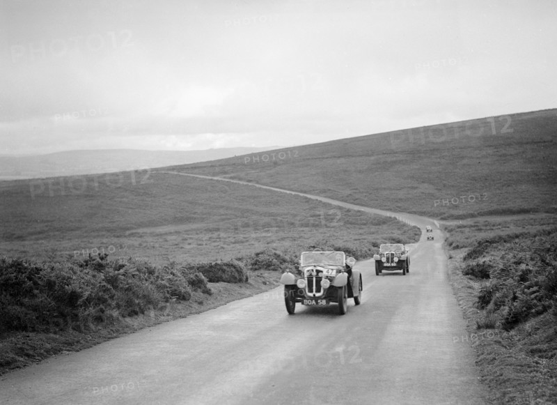 Austin 7s of CD Buckley and Bert Hadley competing at the MCC Torquay Rally, July 1937. Artist: Bill Brunell.