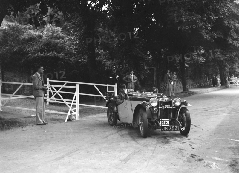 Cream Cracker Team MG PB of CAN May competing at the MCC Torquay Rally, July 1937. Artist: Bill Brunell.