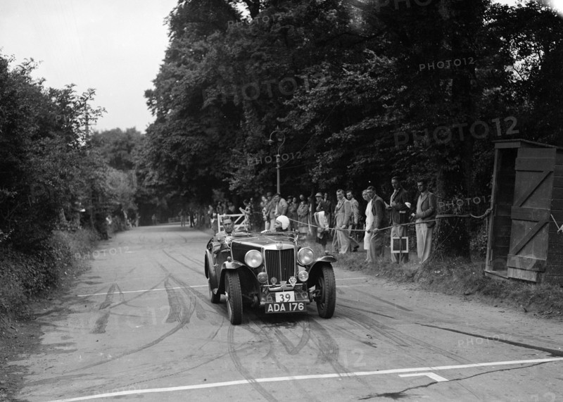 AB Langley's MG Magnette competing at the MCC Torquay Rally, July 1937. Artist: Bill Brunell.
