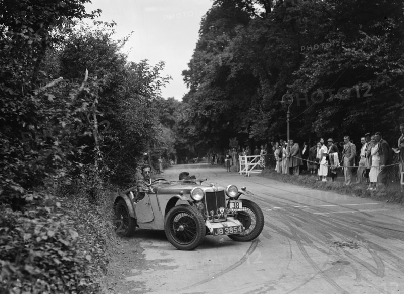 JA Bastock's MG PA, winner of a silver award at the MCC Torquay Rally, July 1937. Artist: Bill Brunell.