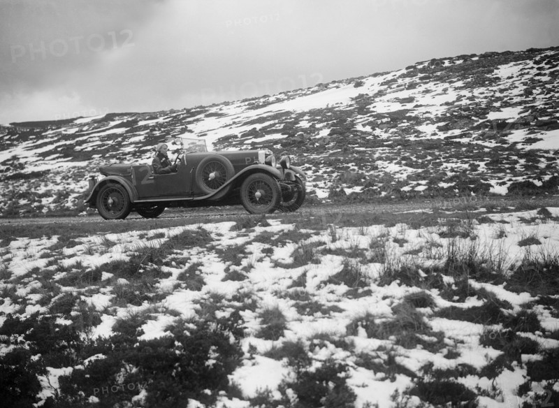 Kitty Brunell road testing a MG 18/80, April 1931. Artist: Bill Brunell.