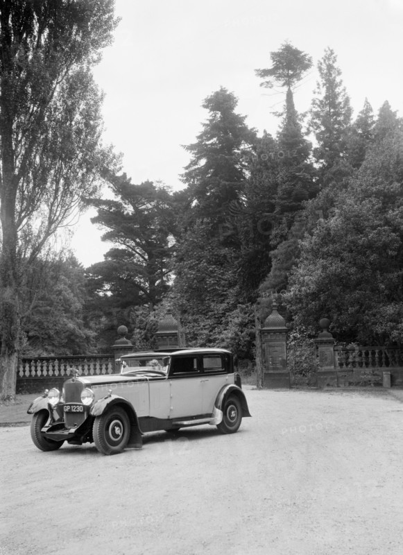Kitty Brunell road testing a 1931 Delage D8, Wykehurst Place, Bolney, Sussex. Artist: Bill Brunell.