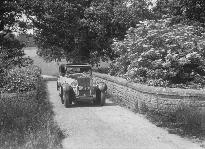 Kitty Brunell road testing a 1931 Delage D8. Artist: Bill Brunell.