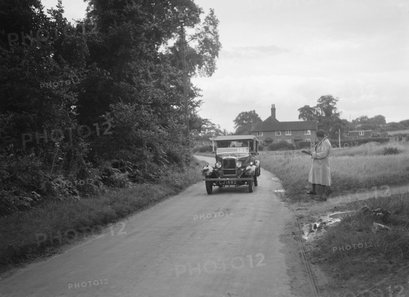 Morris Cowley Tourer taking part in a First Aid Nursing Yeomanry trial or rally, 1931. Artist: Bill Brunell.