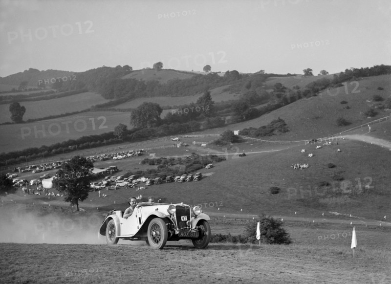 Singer competing in the Singer CC Rushmere Hill Climb, Shropshire 1935. Artist: Bill Brunell.