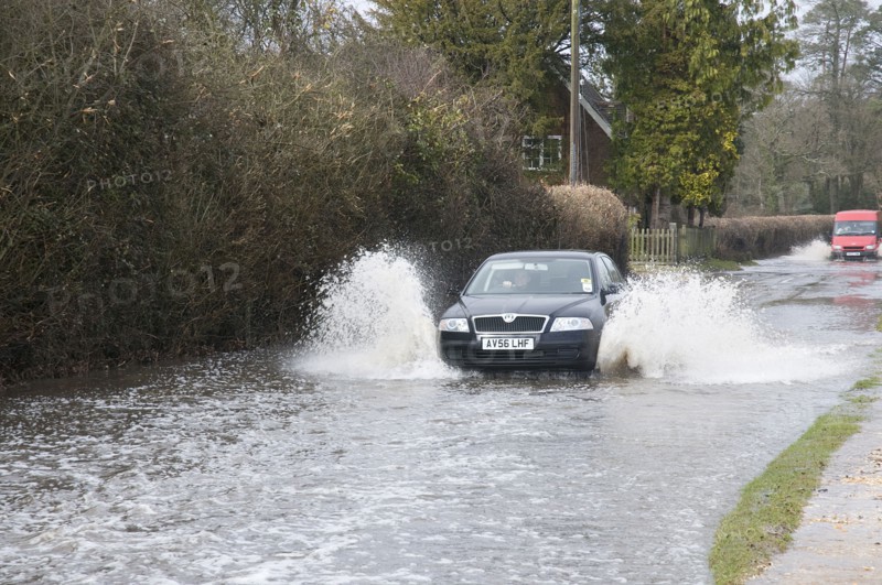 Skoda driving fast through floodwater at Beaulieu 2008. Artist: Unknown.