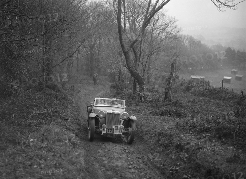 1936 MG TA taking part in a motoring trial, late 1930s. Artist: Bill Brunell.