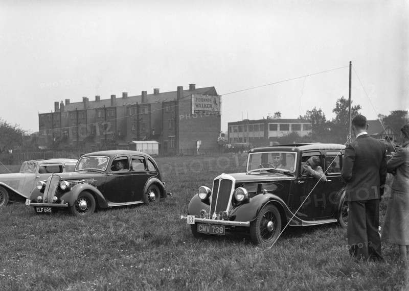 Standard SS I, Flying Twelve and Twelve at the Standard Car Owners Club Gymkhana, 8 May 1938. Artist: Bill Brunell.