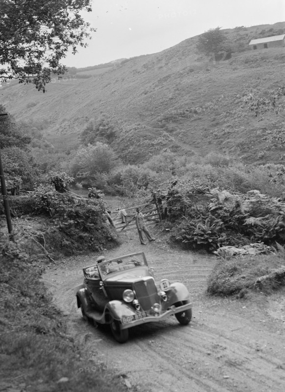 1934 Ford V8 tourer taking part in a motoring trial, late 1930s. Artist: Bill Brunell.