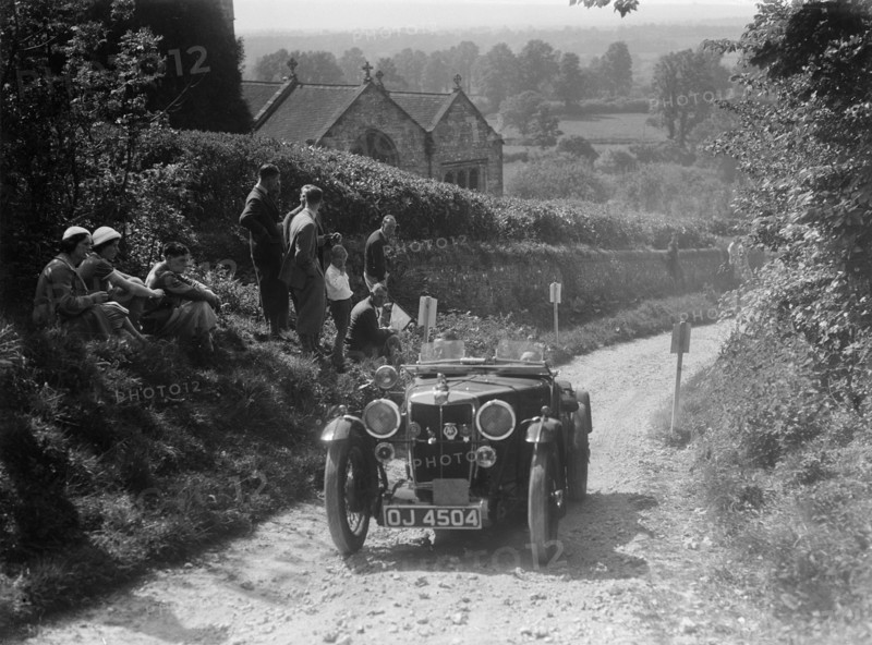1932 MG J2 Standard taking part in a West Hants Light Car Club Trial, Ibberton Hill, Dorset, 1930s. Artist: Bill Brunell.