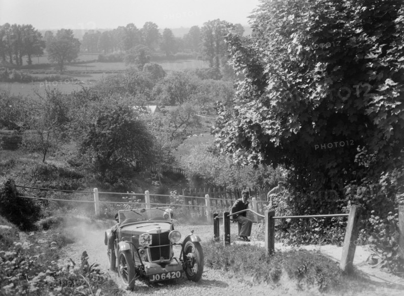 1933 MG J2 Standard taking part in a West Hants Light Car Club Trial, Ibberton Hill, Dorset, 1930s. Artist: Bill Brunell.