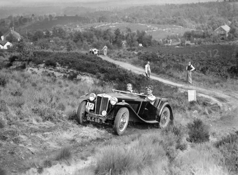 1936 MG TA taking part in the NWLMC Lawrence Cup Trial, 1937. Artist: Bill Brunell.
