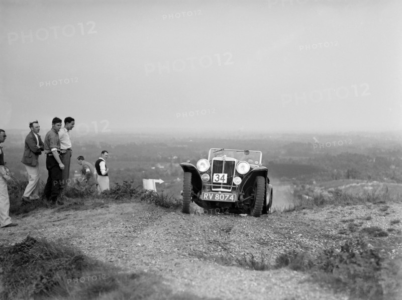 1936 MG PB 2-seater sports taking part in the NWLMC Lawrence Cup Trial, 1937. Artist: Bill Brunell.