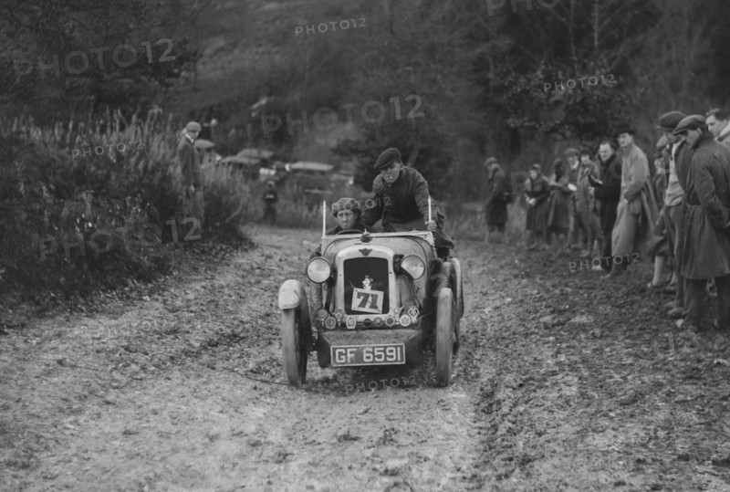 Austin 7 Boyd Carpenter 2-seater sports of E Stockvis taking part in the Inter-Varsity Trial, 1930. Artist: Bill Brunell.