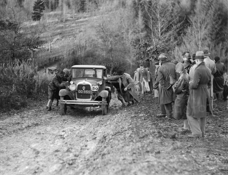 KHL Seaton's Ford Model A saloon receiving a push in the Inter-Varsity Trial, 1930. Artist: Bill Brunell.