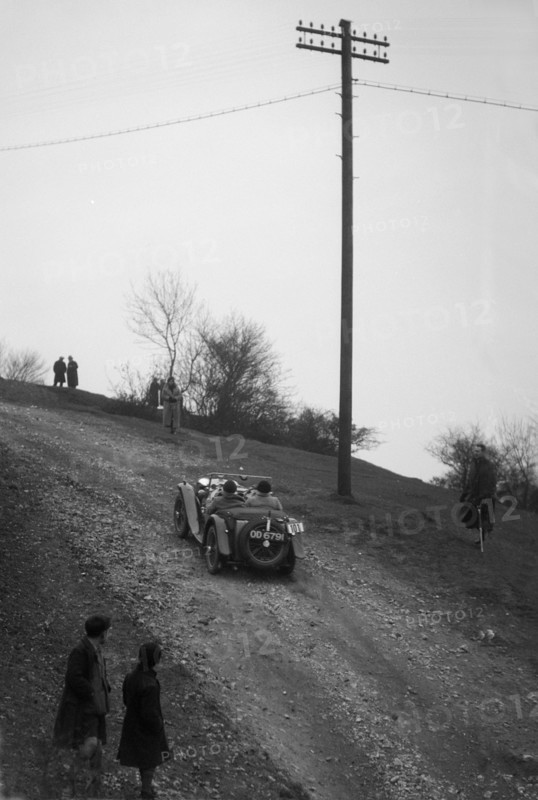 Miss EV Watson's MG J3 climbing Nailsworth Ladder, Sunbac Colmore Trial, Gloucestershire, 1934. Artist: Bill Brunell.