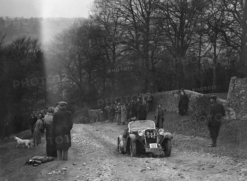 Singer of WDV Norman climbing Nailsworth Ladder, Sunbac Colmore Trial, Gloucestershire, 1934. Artist: Bill Brunell.