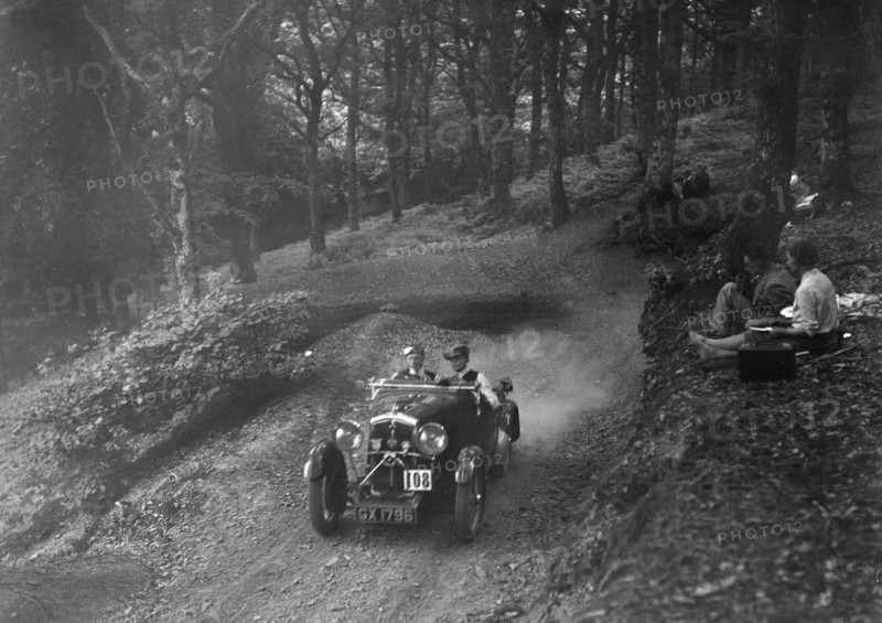 Wolseley Hornet of WAV Davis, B&HMC Brighton-Beer Trial, Fingle Bridge Hill, Devon, 1934. Artist: Bill Brunell.