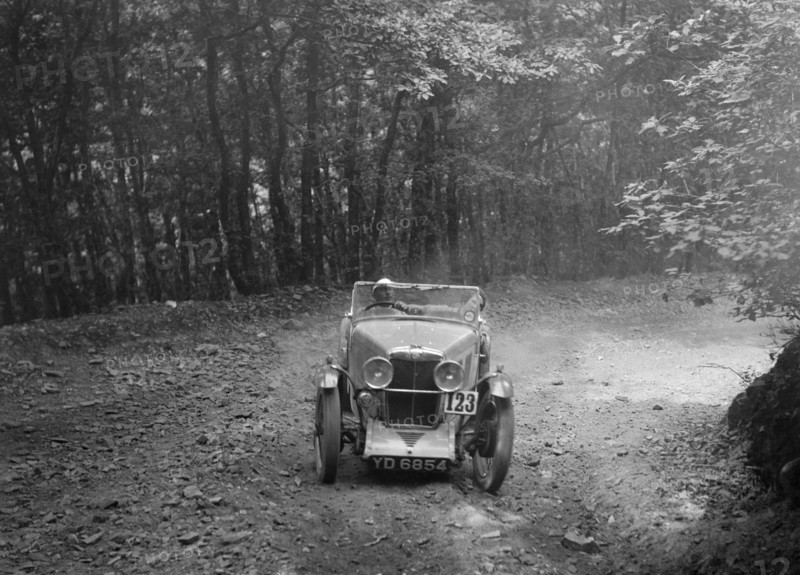 MG J2 competing in the B&HMC Brighton-Beer Trial, Fingle Bridge Hill, Devon, 1934. Artist: Bill Brunell.