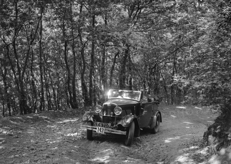 Crossley of CR Simnett competing in the B&HMC Brighton-Beer Trial, Fingle Bridge Hill, Devon, 1934. Artist: Bill Brunell.