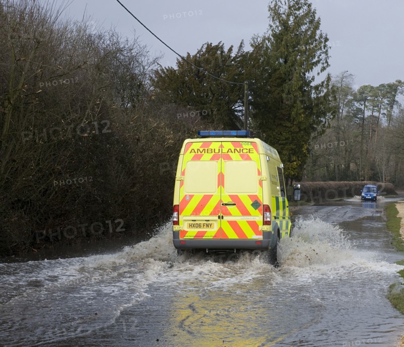 Ambulance driving through Floods at Beauleu 2008. Artist: Unknown.