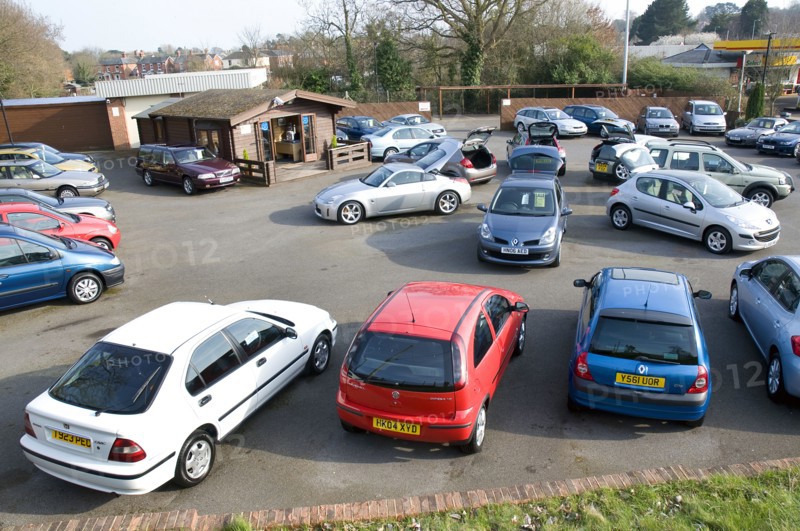 Used Car Dealership Forecourt 2009 Artist: Unknown.