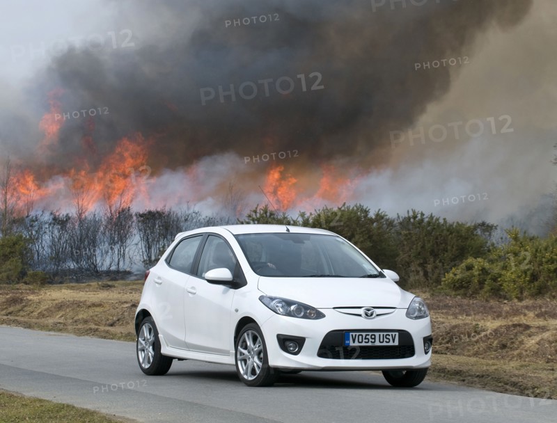 2010 Mazda 2 Sport, controlled burning in New Forest Artist: Unknown.